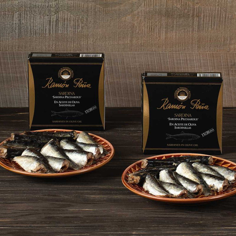 duo of sardines in their cans