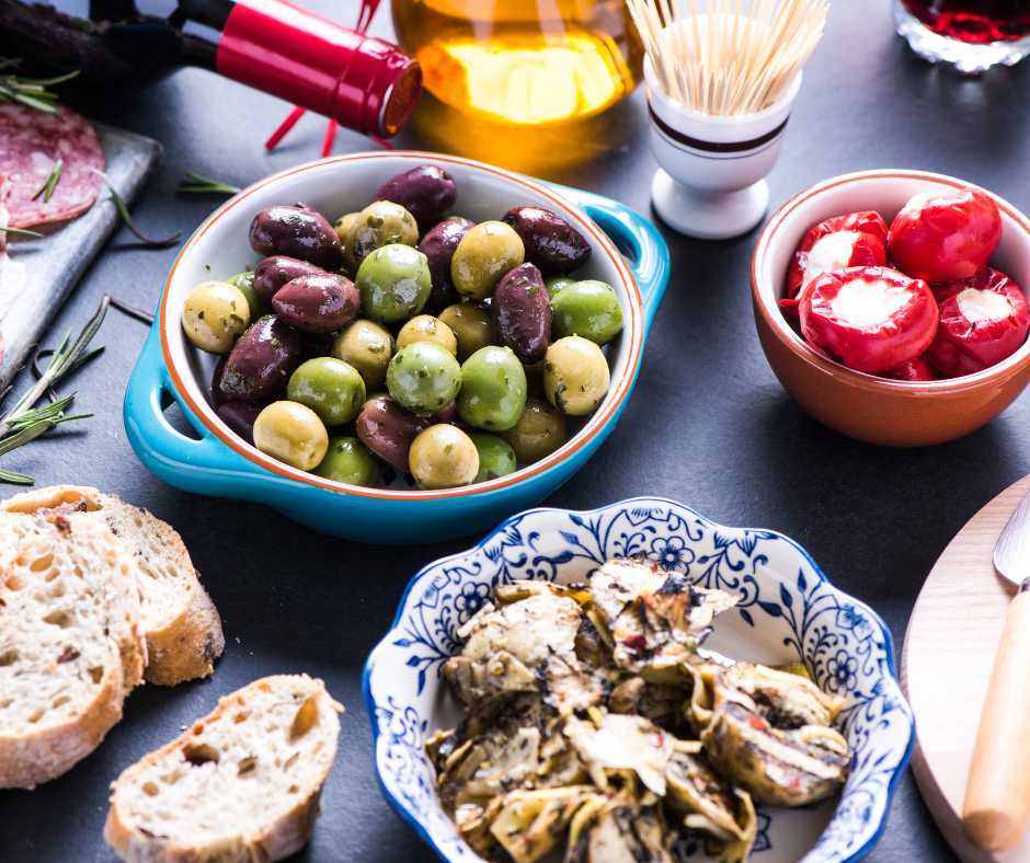 table with olives and tomatoes