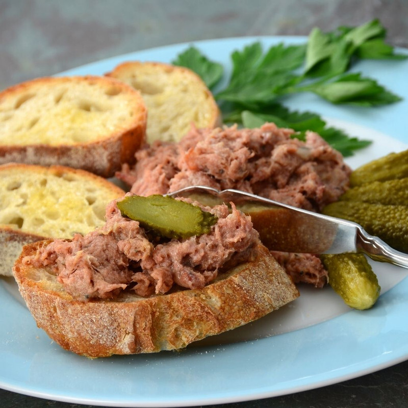 duck rilletes on a piece of baguette